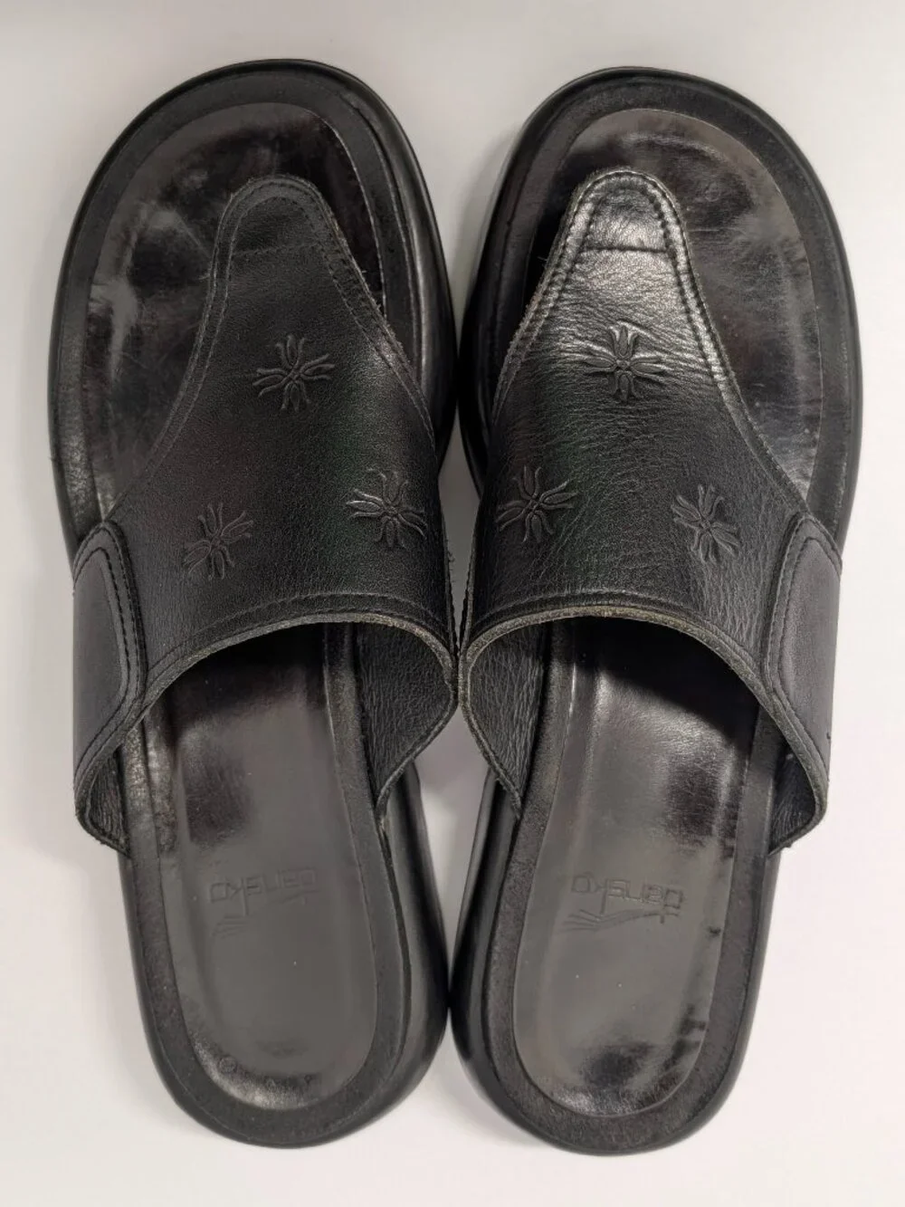 Dansko Floral Embossed Thong Sandals in Black Leather